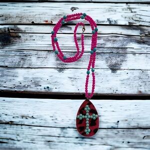 NWOT pink and teal cross necklace